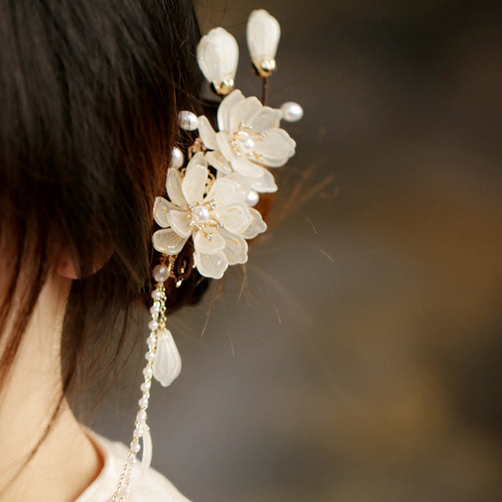 Fermaglio per capelli laterale con nappa di magnolia classica Buddha Stones