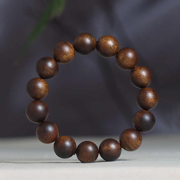 Buddha Stones Cambogia Qinan Agarwood Braccialetto di equilibrio dell'acqua che affonda a nove punti