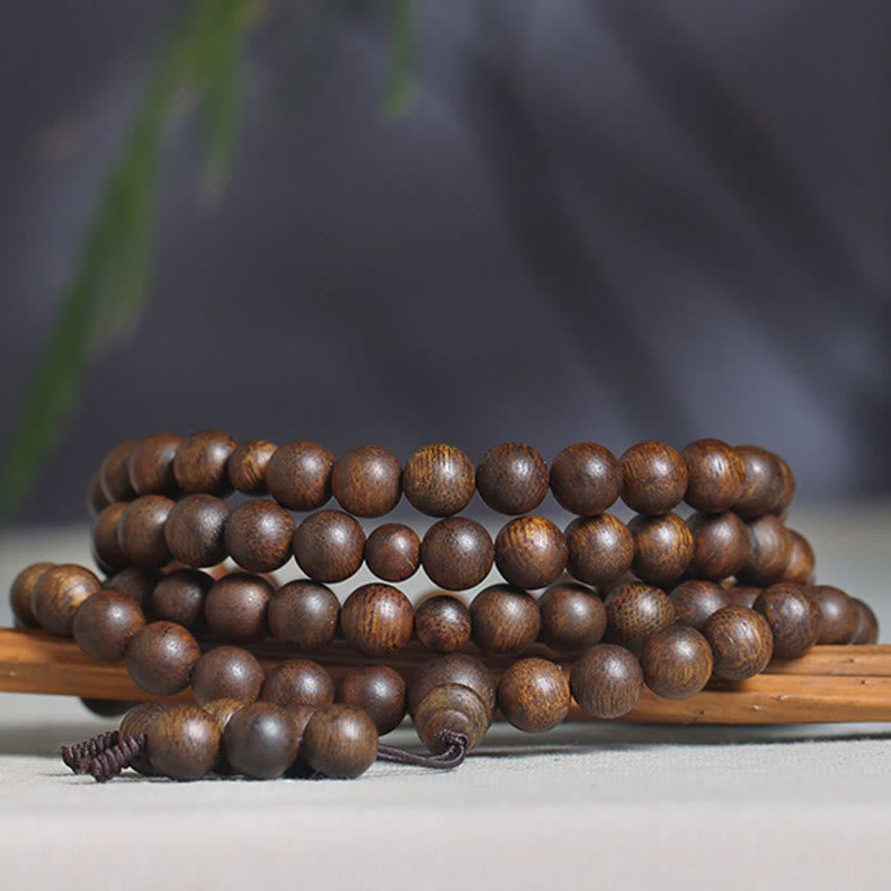Buddha Stones Cambogia Qinan Agarwood Braccialetto di equilibrio dell'acqua che affonda a nove punti
