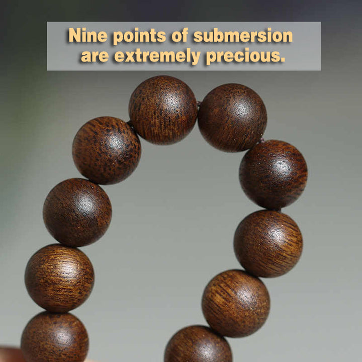 Buddha Stones Cambogia Qinan Agarwood Braccialetto di equilibrio dell'acqua che affonda a nove punti