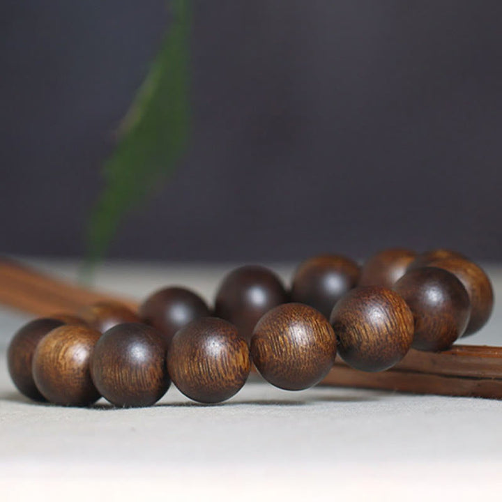 Buddha Stones Cambogia Qinan Agarwood Braccialetto di equilibrio dell'acqua che affonda a nove punti