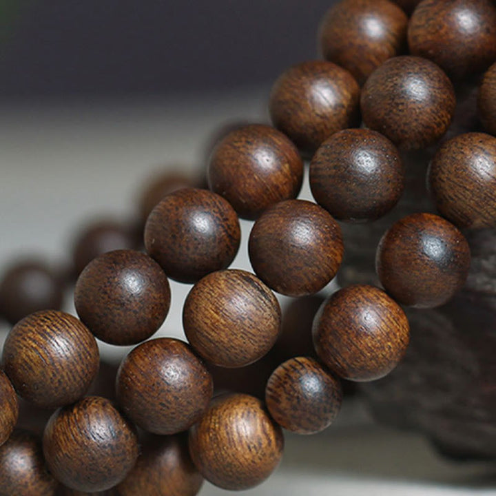 Buddha Stones Cambogia Qinan Agarwood Braccialetto di equilibrio dell'acqua che affonda a nove punti