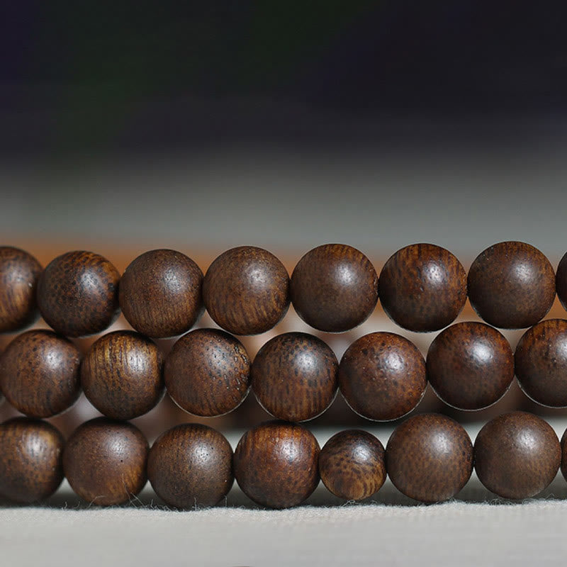Buddha Stones Cambogia Qinan Agarwood Braccialetto di equilibrio dell'acqua che affonda a nove punti