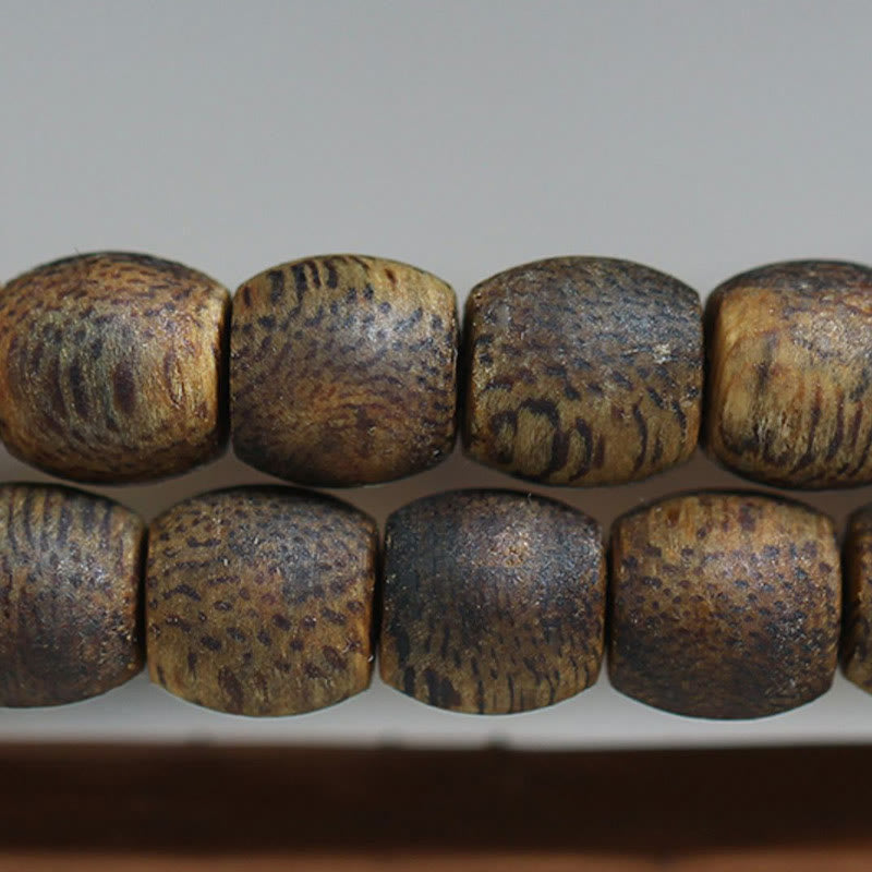 Buddha Stones 108 perline Mala da 6 mm con perline cilindriche Hainan Verde Qinan Bracciale calmo in legno di agar