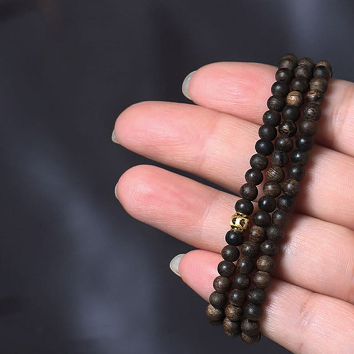 Buddha Stones 108 Mala Beads 999 Gold Bead Raro 5mm Brunei Nero Qinan Agarwood Bracciale Forza della Pace