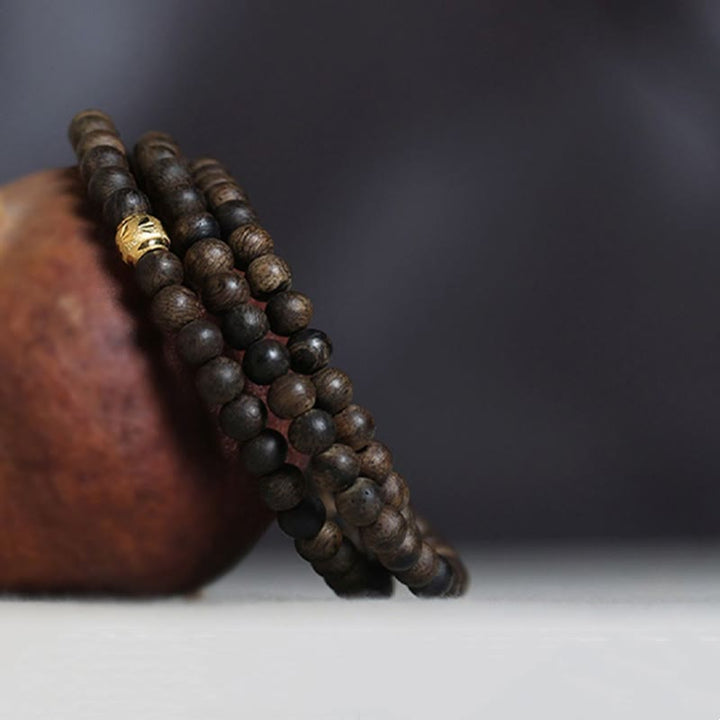 Buddha Stones 108 Mala Beads 999 Gold Bead Raro 5mm Brunei Nero Qinan Agarwood Bracciale Forza della Pace