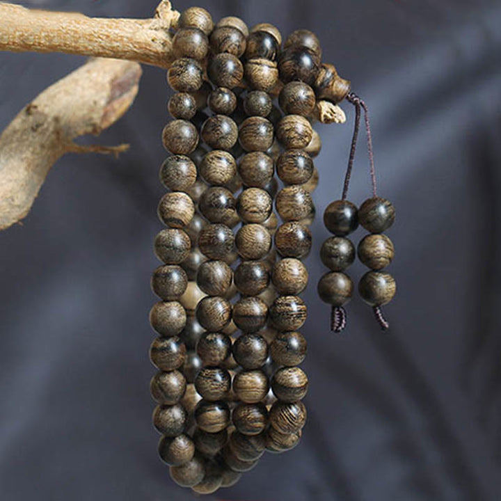 Bracciale con Buddha Stones, 108 perle di Mala, legno di agar naturale Tarakan, per allontanare gli spiriti maligni