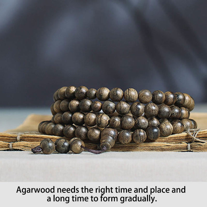 Bracciale con Buddha Stones, 108 perle di Mala, legno di agar naturale Tarakan, per allontanare gli spiriti maligni