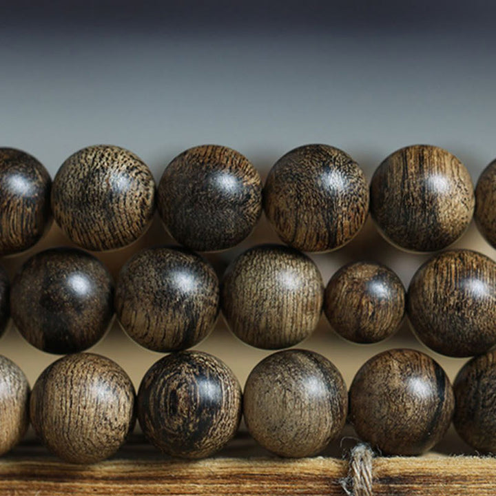 Bracciale con Buddha Stones, 108 perle di Mala, legno di agar naturale Tarakan, per allontanare gli spiriti maligni