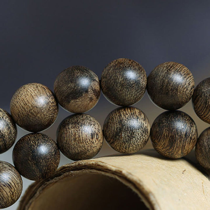 Bracciale con Buddha Stones, 108 perle di Mala, legno di agar naturale Tarakan, per allontanare gli spiriti maligni
