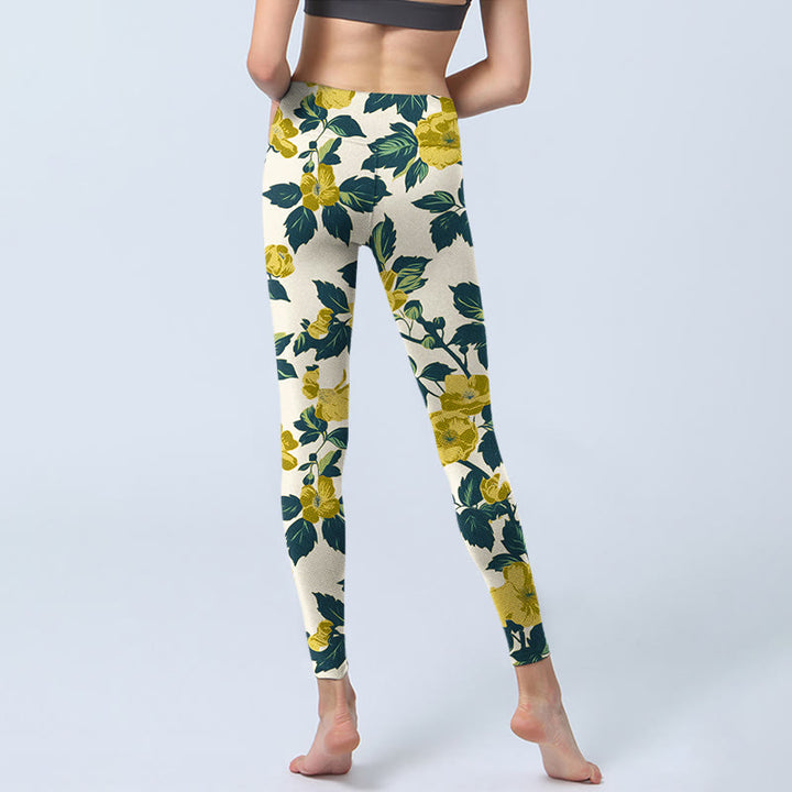 Leggings da palestra con stampa di Buddha Stones, fiori gialli, foglie verdi, pantaloni da yoga da donna