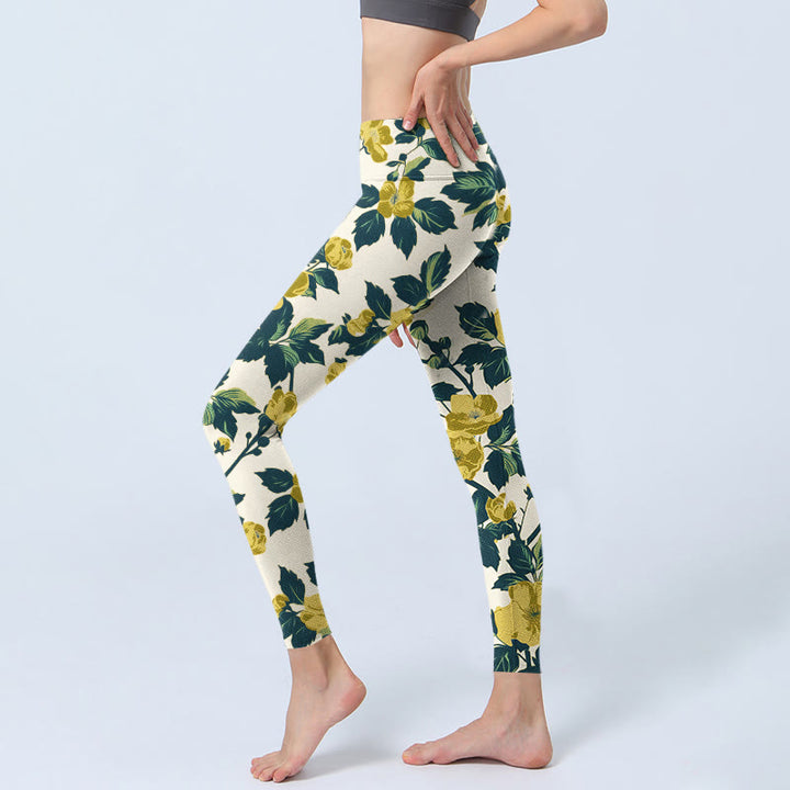 Leggings da palestra con stampa di Buddha Stones, fiori gialli, foglie verdi, pantaloni da yoga da donna