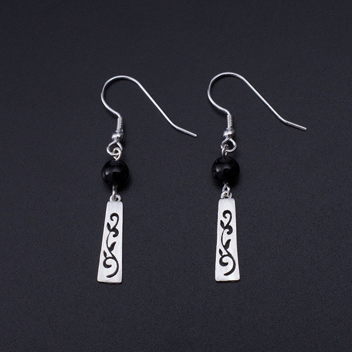 Orecchini pendenti con protezione a forma di vite cava in onice nero in argento sterling 925 Buddha Stones