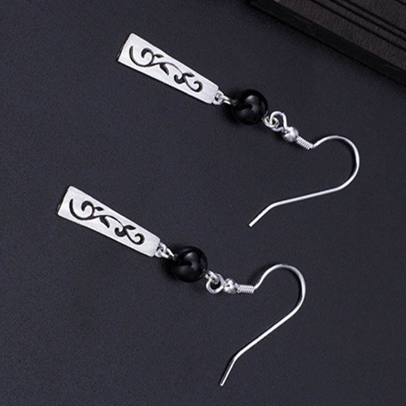 Orecchini pendenti con protezione a forma di vite cava in onice nero in argento sterling 925 Buddha Stones - image 2