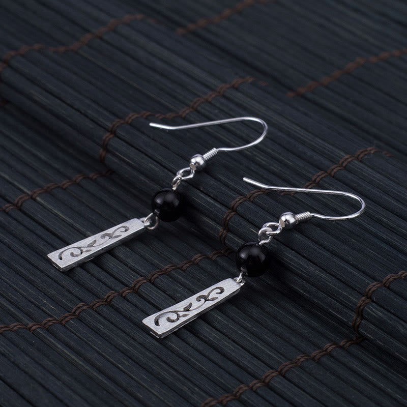 Orecchini pendenti con protezione a forma di vite cava in onice nero in argento sterling 925 Buddha Stones