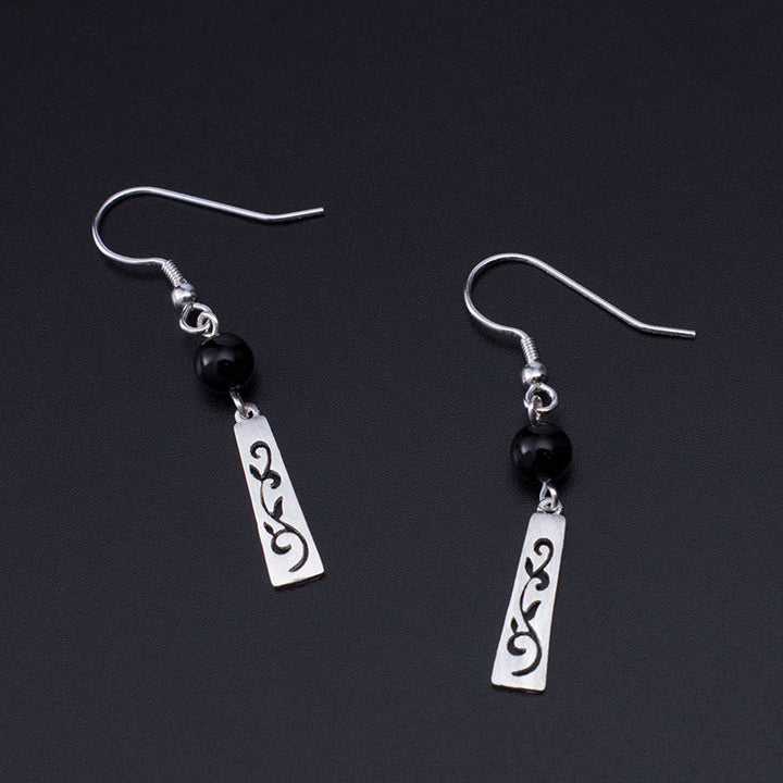 Orecchini pendenti con protezione a forma di vite cava in onice nero in argento sterling 925 Buddha Stones