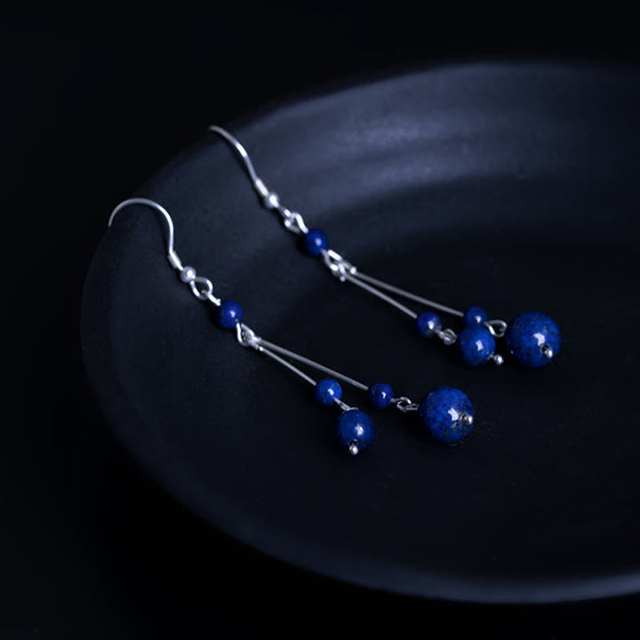 Orecchini pendenti Serenity in argento sterling 925 con perle di lazurite e pietre Buddha Stones