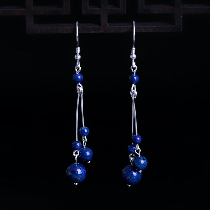 Orecchini pendenti Serenity in argento sterling 925 con perle di lazurite e pietre Buddha Stones