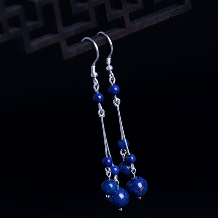 Orecchini pendenti Serenity in argento sterling 925 con perle di lazurite e pietre Buddha Stones