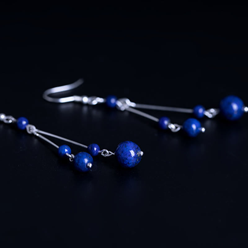 Orecchini pendenti Serenity in argento sterling 925 con perle di lazurite e pietre Buddha Stones