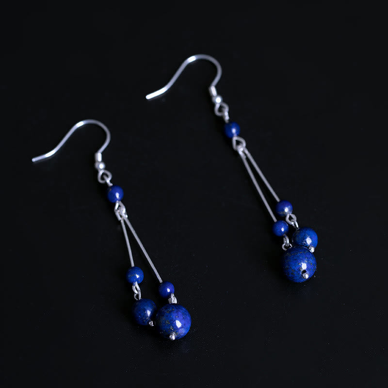 Orecchini pendenti Serenity in argento sterling 925 con perle di lazurite e pietre Buddha Stones