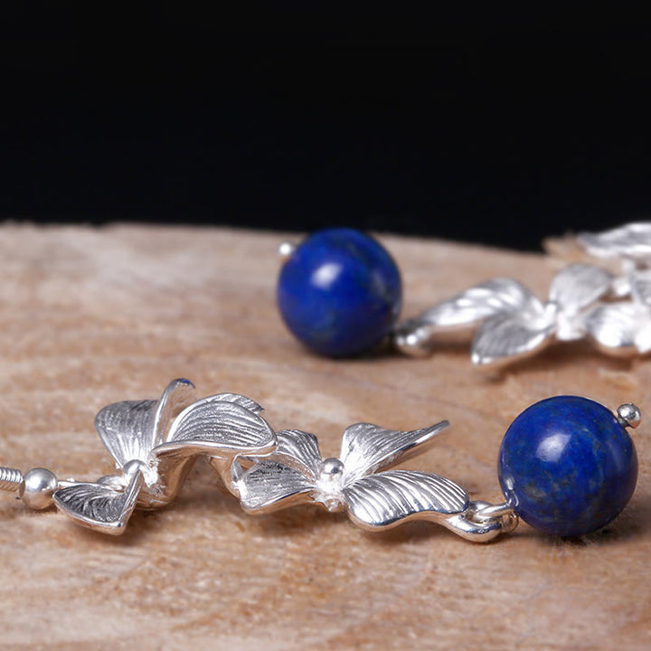 Orecchini pendenti positivi in stile etnico con fiori in argento sterling 925 e lazurite Buddha Stones