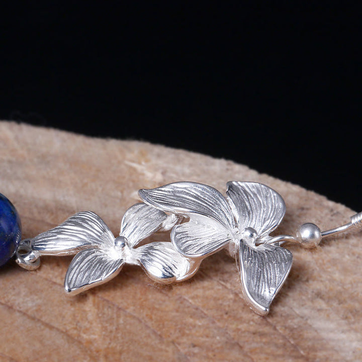 Orecchini pendenti positivi in stile etnico con fiori in argento sterling 925 e lazurite Buddha Stones