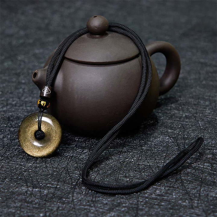 Buddha Stones Collana pendente con fibbia della pace in ossidiana naturale lucidata in oro