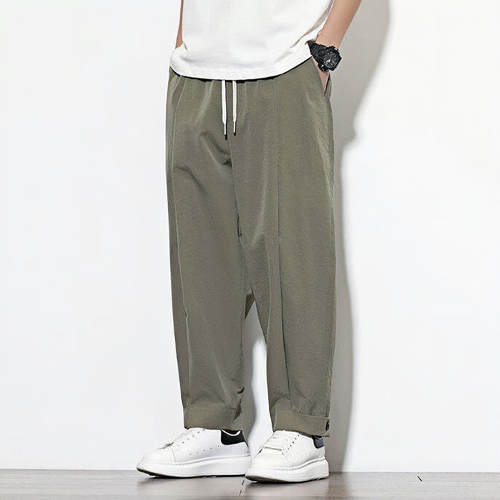 Pantaloni harem da uomo casual a tinta unita con coulisse e tasche, con motivo Buddha Stones. - image 3