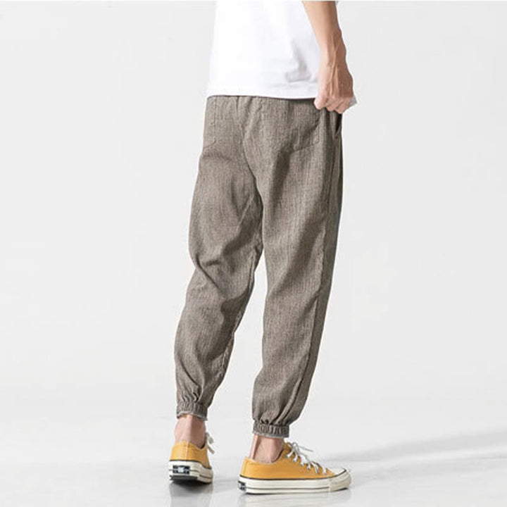 Pantaloni da uomo in lino con tasche e coulisse semplice motivo Buddha Stones
