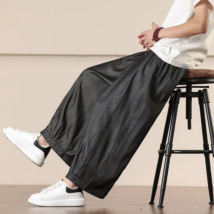 Pantaloni larghi da uomo con coulisse e tasche, tinta unita, modello Buddha Stones Spring - image 1