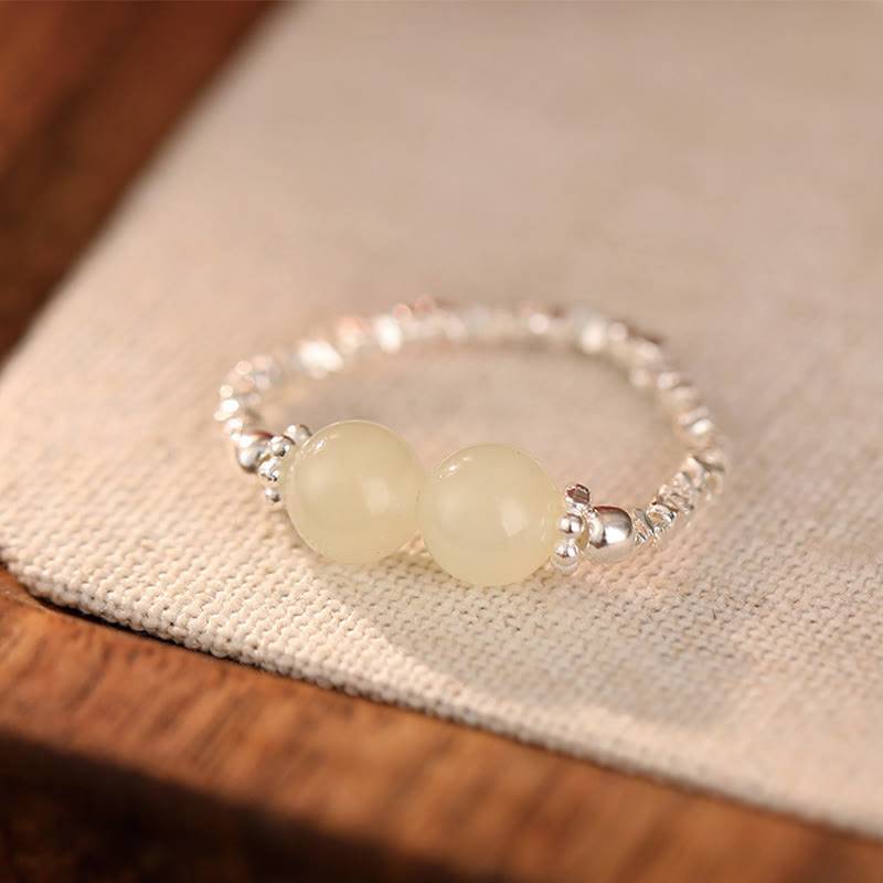 Anello elastico con perline di giada Hetian naturale in argento sterling 925 Buddha Stones