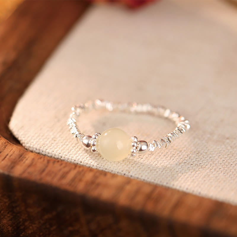 Anello elastico con perline di giada Hetian naturale in argento sterling 925 Buddha Stones
