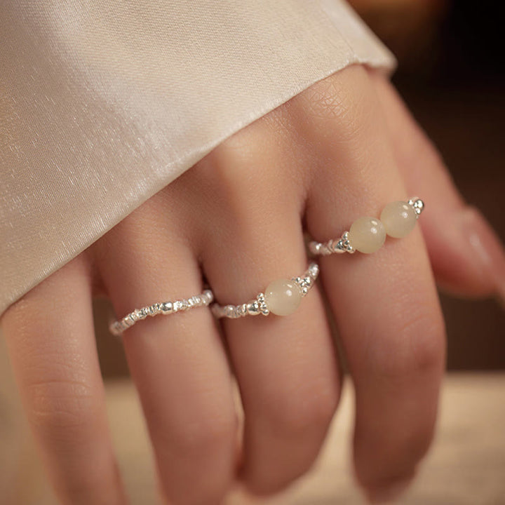 Anello elastico con perline di giada Hetian naturale in argento sterling 925 Buddha Stones