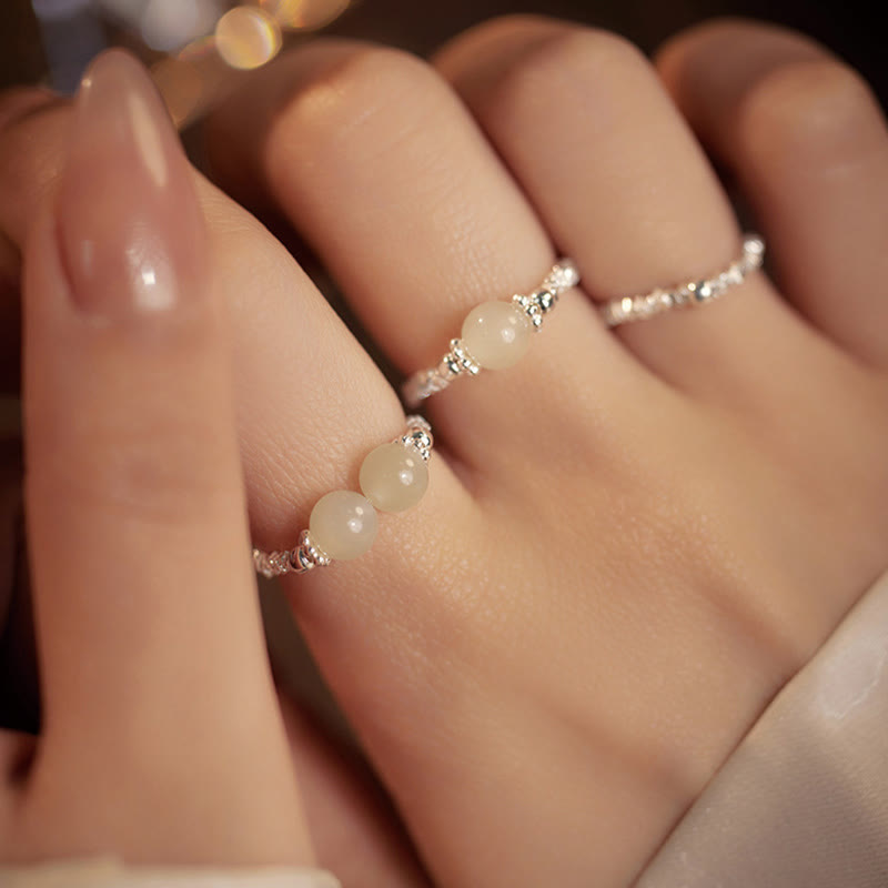 Anello elastico con perline di giada Hetian naturale in argento sterling 925 Buddha Stones