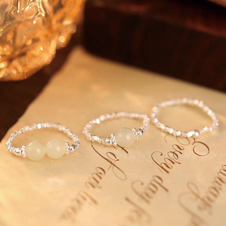Anello elastico con perline di giada Hetian naturale in argento sterling 925 Buddha Stones