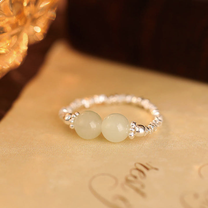 Anello elastico con perline di giada Hetian naturale in argento sterling 925 Buddha Stones