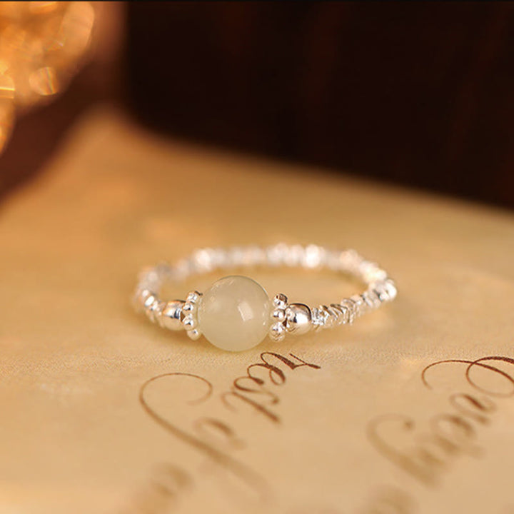 Anello elastico con perline di giada Hetian naturale in argento sterling 925 Buddha Stones