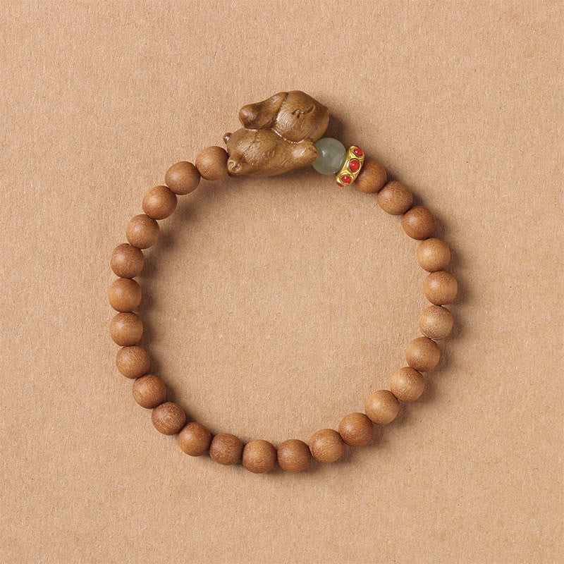 Braccialetto positivo con coniglio carino in legno di sandalo verde e oro Buddha Stones