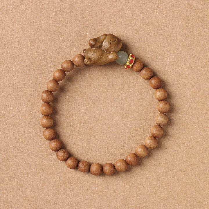 Braccialetto positivo con coniglio carino in legno di sandalo verde e oro Buddha Stones