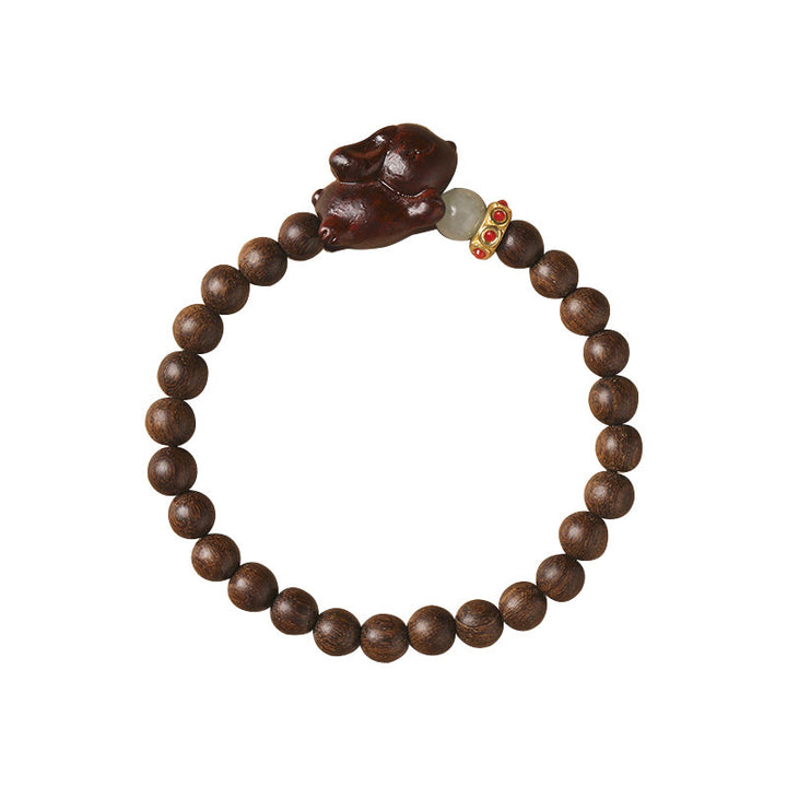 Braccialetto positivo con coniglio carino in legno di sandalo verde e oro Buddha Stones