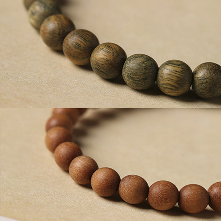 Braccialetto positivo con coniglio carino in legno di sandalo verde e oro Buddha Stones