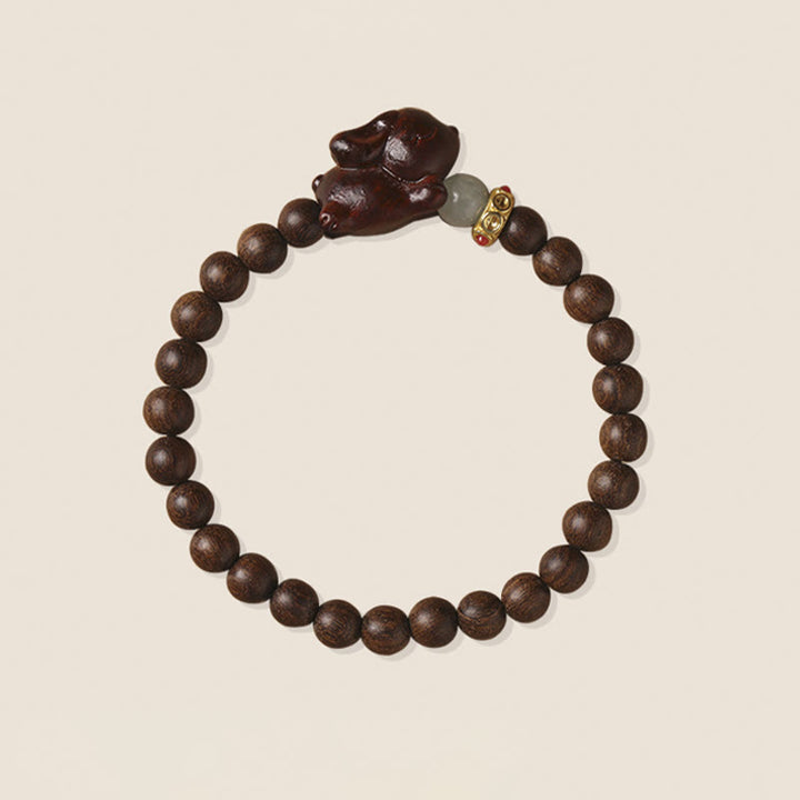 Braccialetto positivo con coniglio carino in legno di sandalo verde e oro Buddha Stones