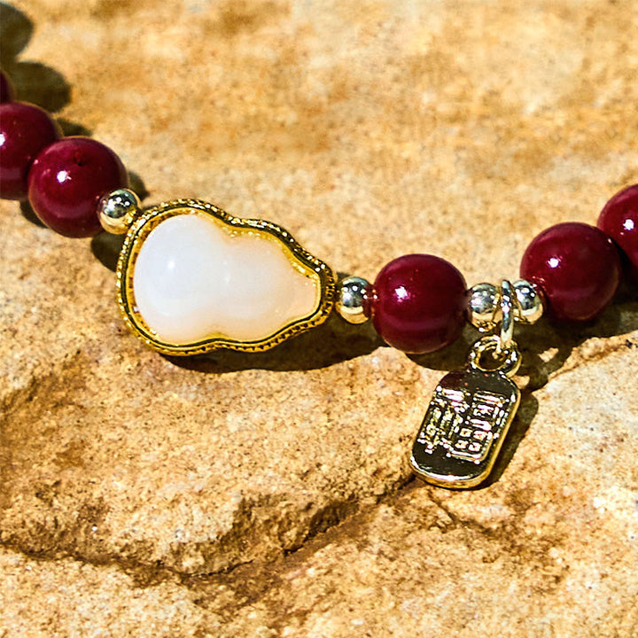 Braccialetto di benedizione con ciondolo Fu, carattere zucca e cinabro Buddha Stones