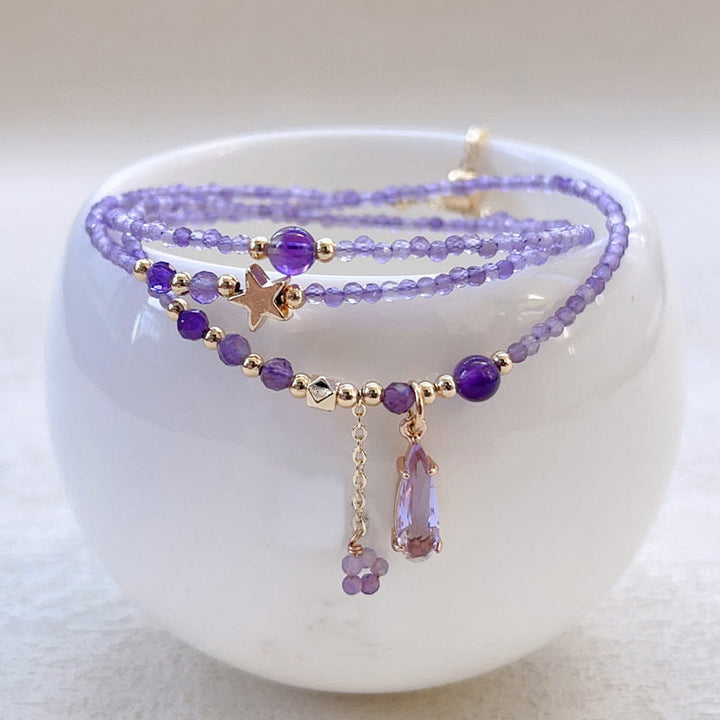 Braccialetto da meditazione a triplo giro con stella a goccia d'acqua in ametista naturale Buddha Stones