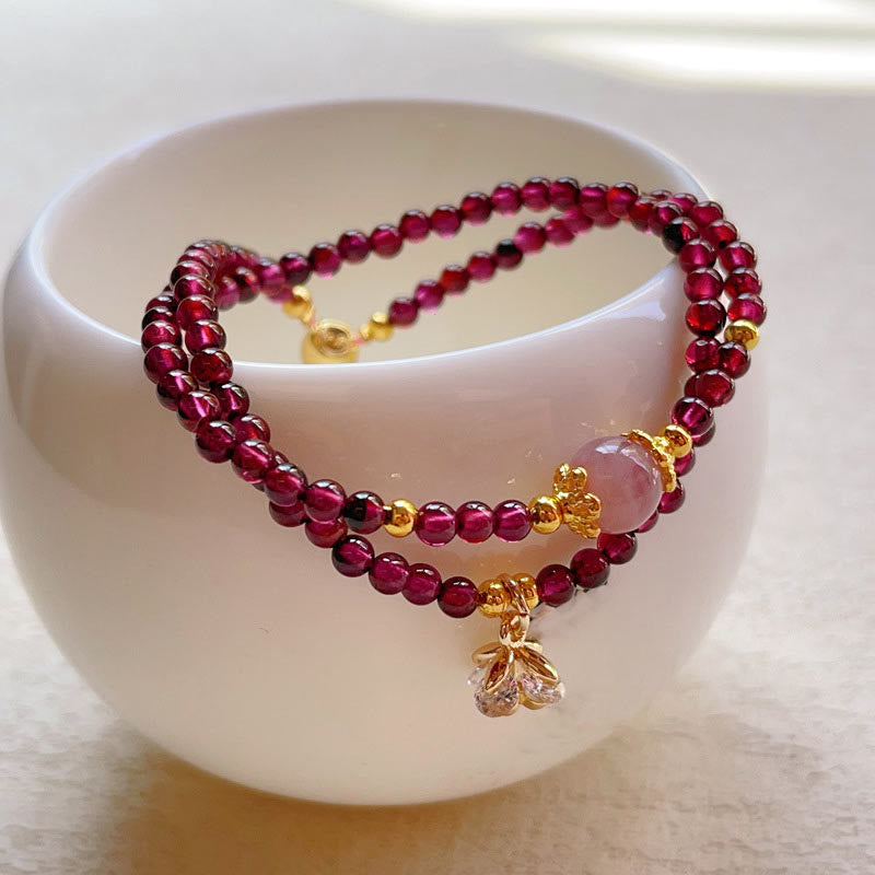 Braccialetto doppio giro in cristallo rosa e granato naturale Buddha Stones