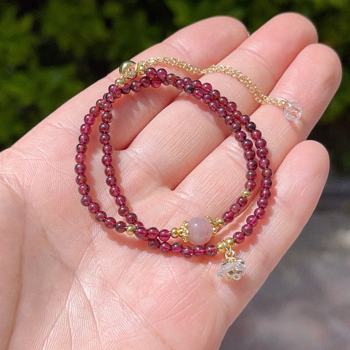 Braccialetto doppio giro in cristallo rosa e granato naturale Buddha Stones