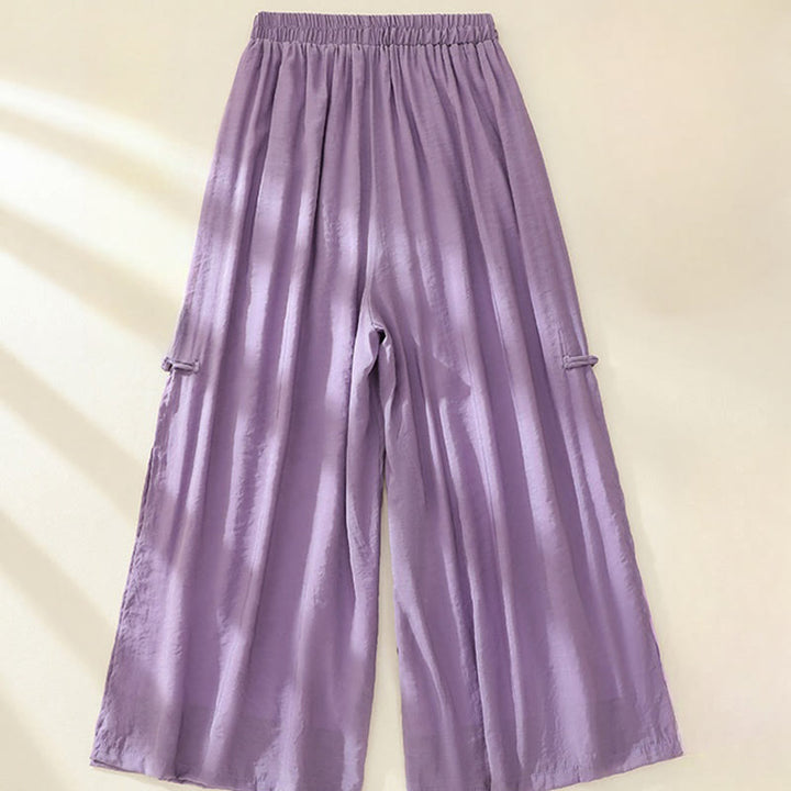 Pantaloni da donna a gamba larga con doppio strato, ricami artistici a forma di fiore e rana cinese, con bottoni e spacco, in Buddha Stones. - image 11