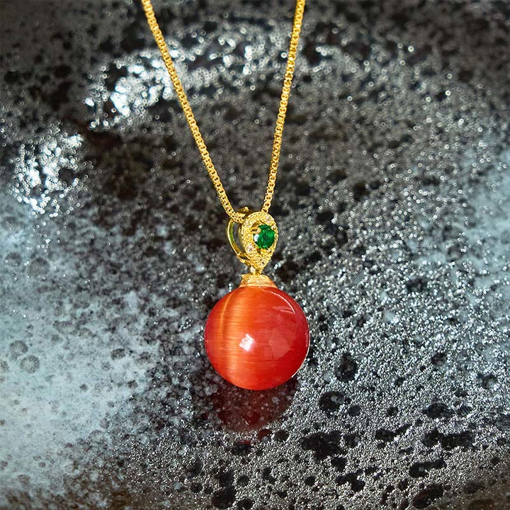 Buddha Stones Collana con ciondolo a forma di palla rotonda con occhio di gatto e simbolo di fiducia - image 9