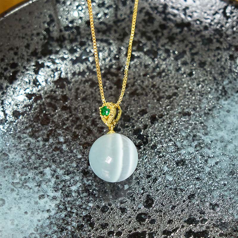 Buddha Stones Collana con ciondolo a forma di palla rotonda con occhio di gatto e simbolo di fiducia - image 23